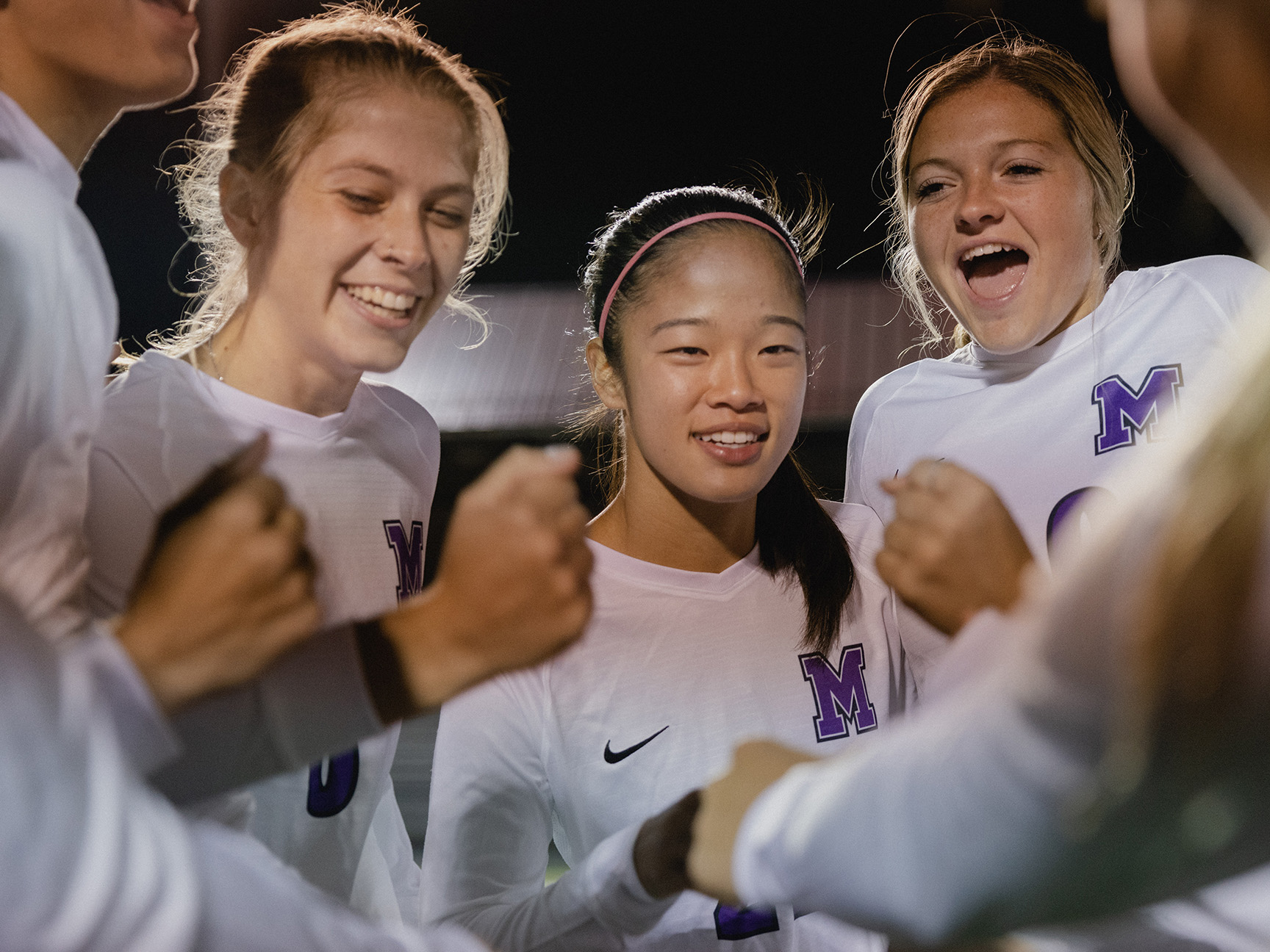 Women's soccer student-athletes celebrating