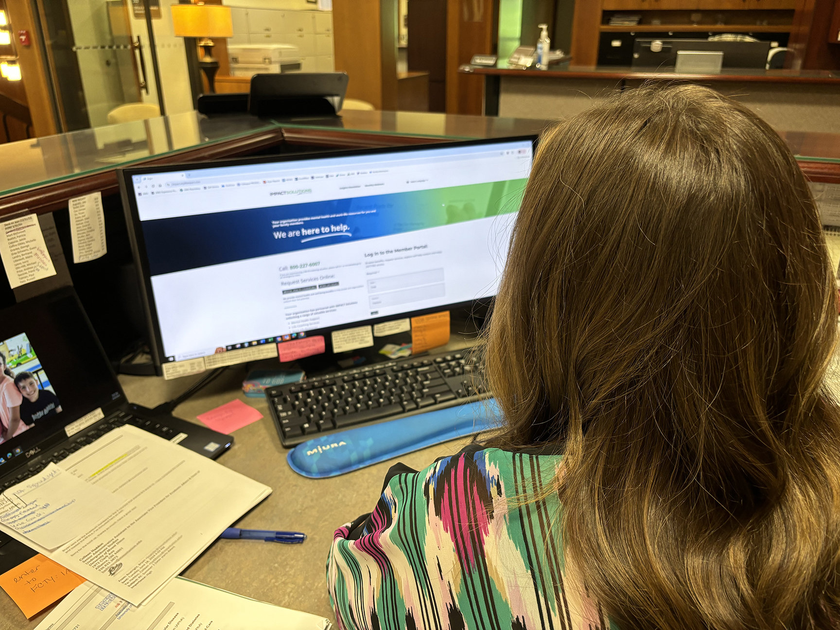 A staff member accessing online counseling resources