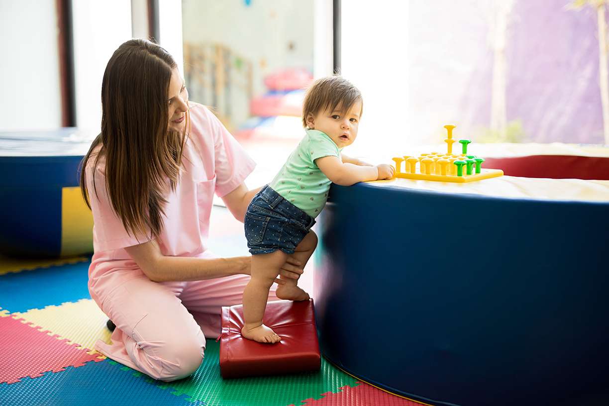 Occupational Therapist working with a toddler