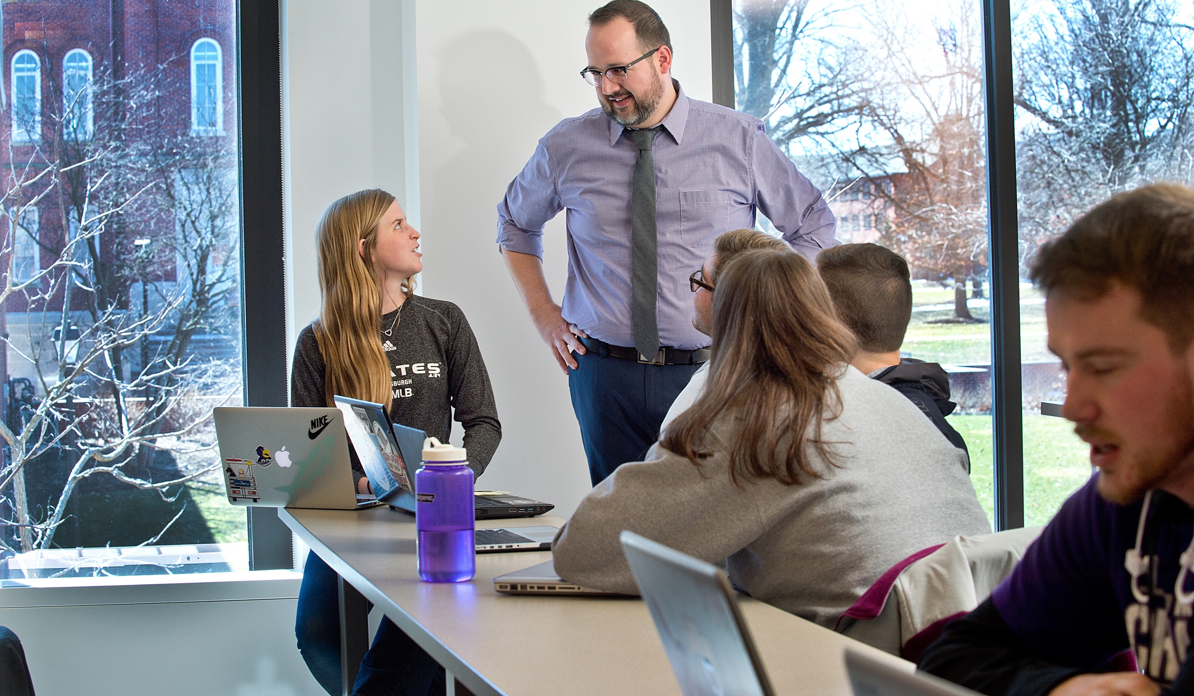 faculty member with student in class