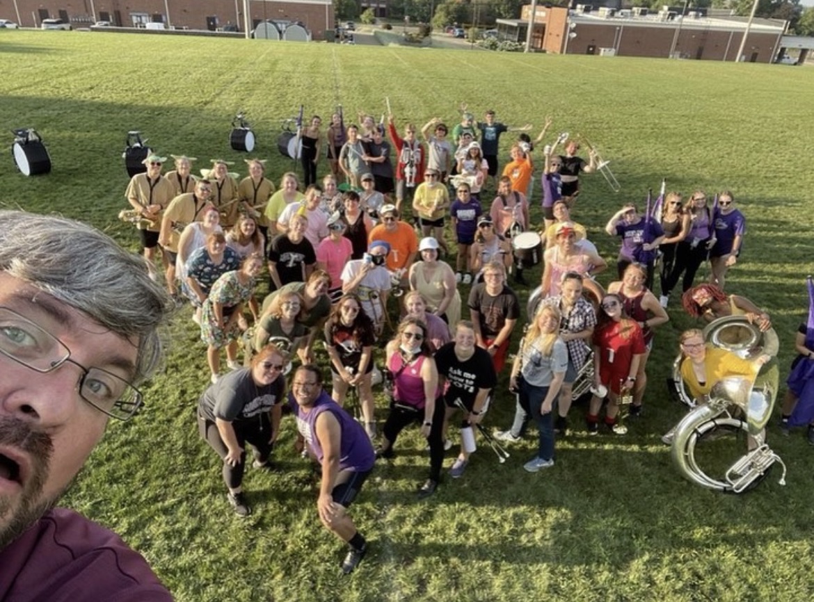 Jeff Neitzke takes a selfie with the 2021 marching band during band camp