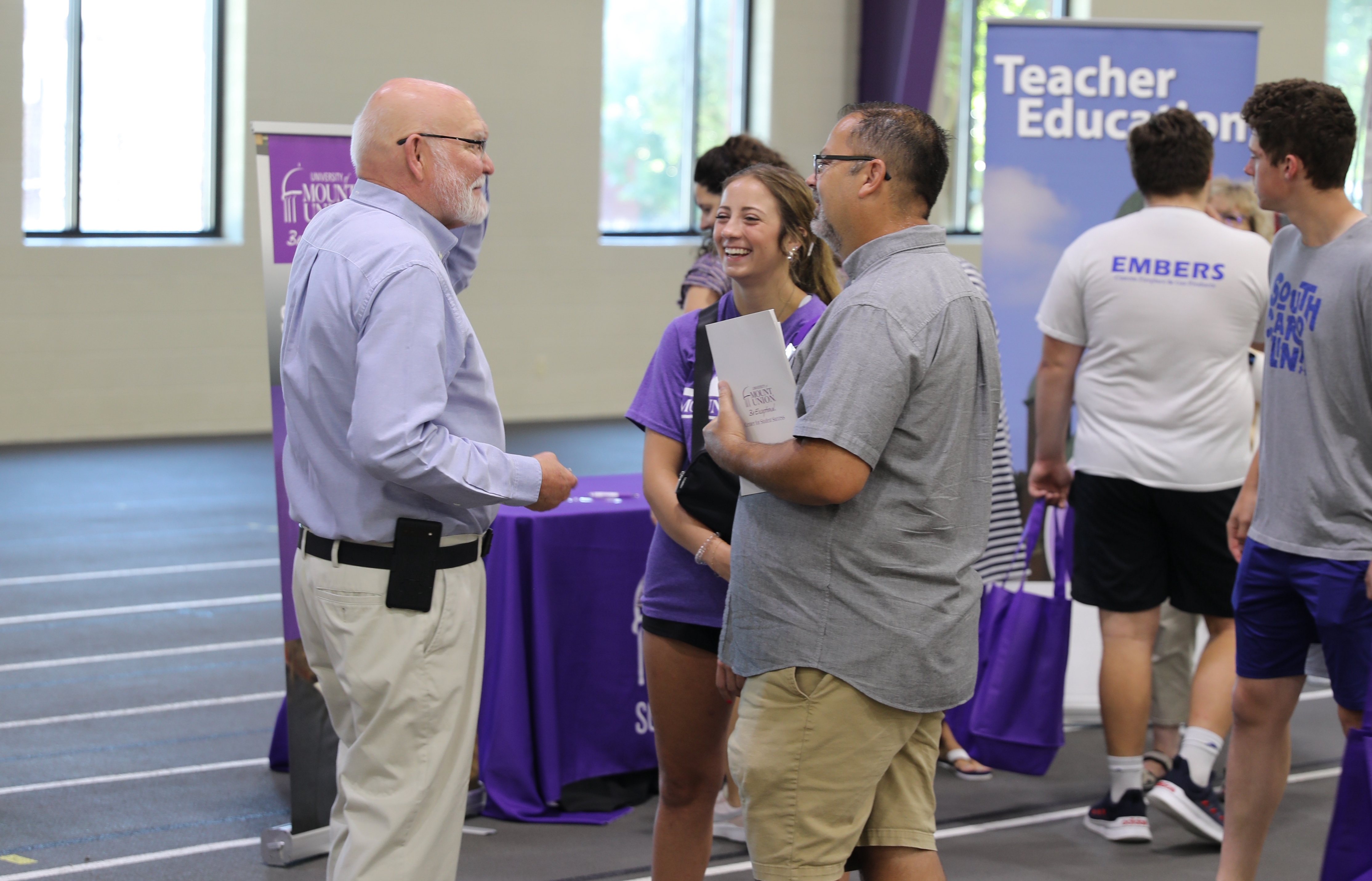 Faculty meeting with family at Preview