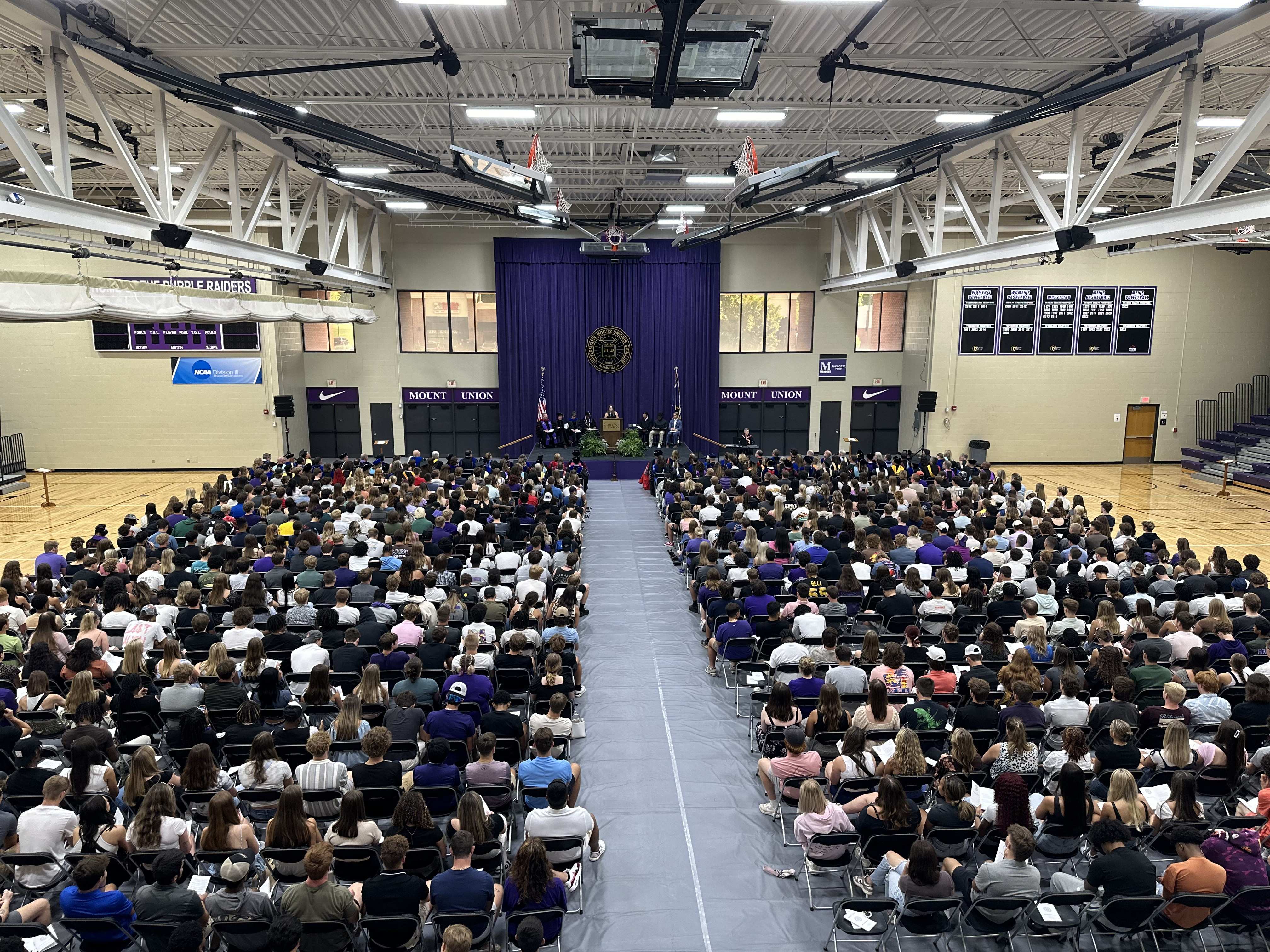 overhead shot of matriculation crowd in gym