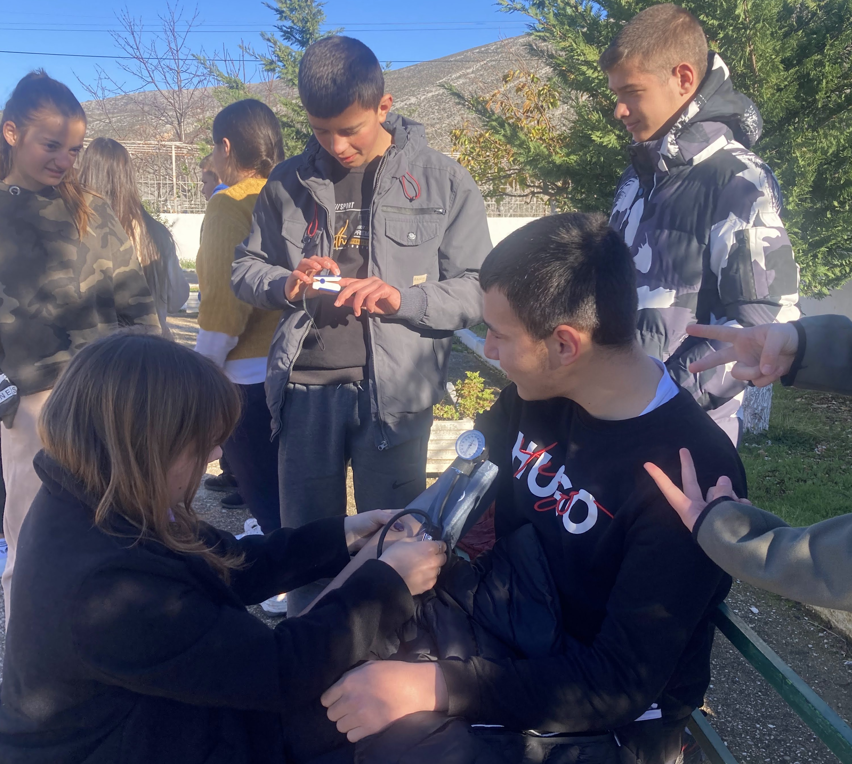 Hunt teaching students about medical care