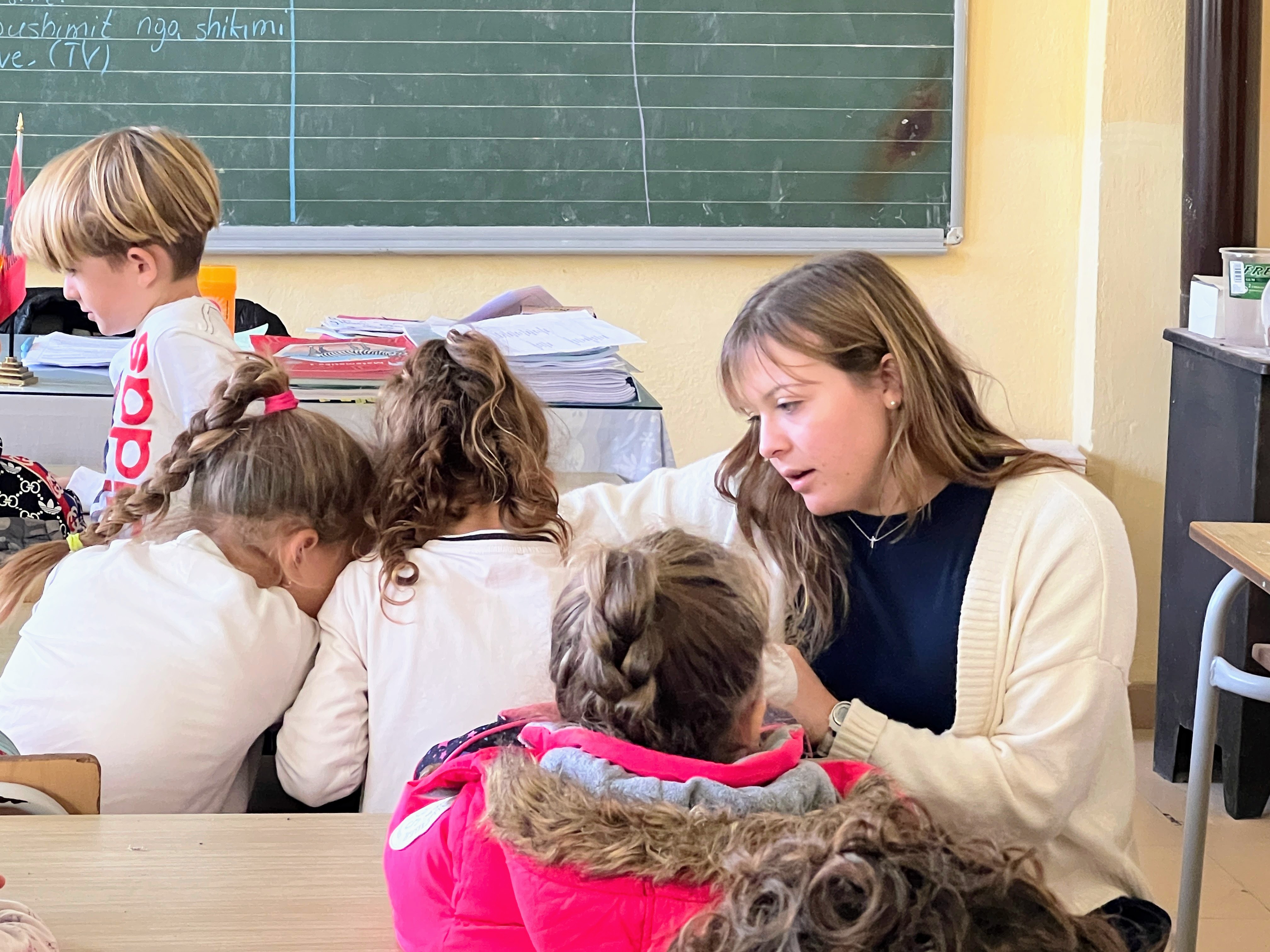 Hunt helping her students