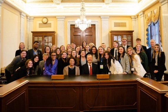 Students pose with representative during a lobby event in DC