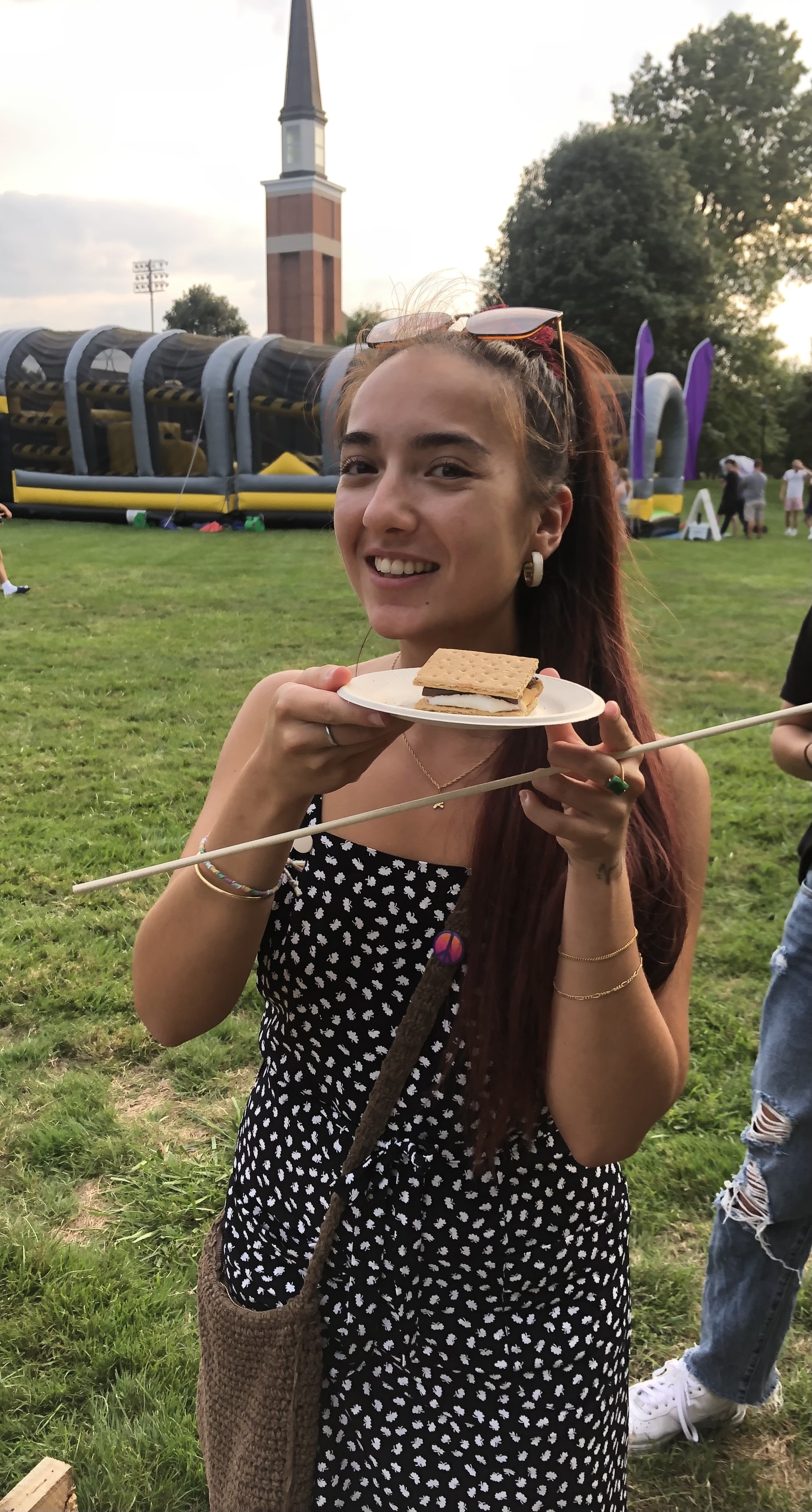 Amandine Lam stands with her first ever s'more