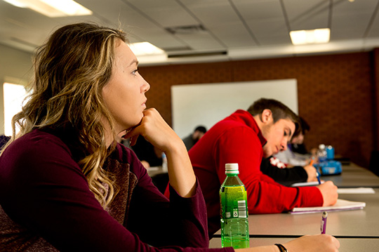 student looking at front of class