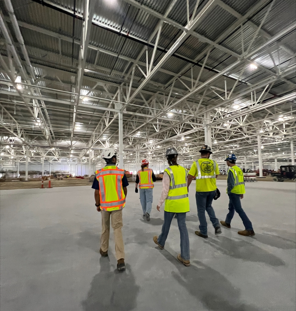 students walking around job site